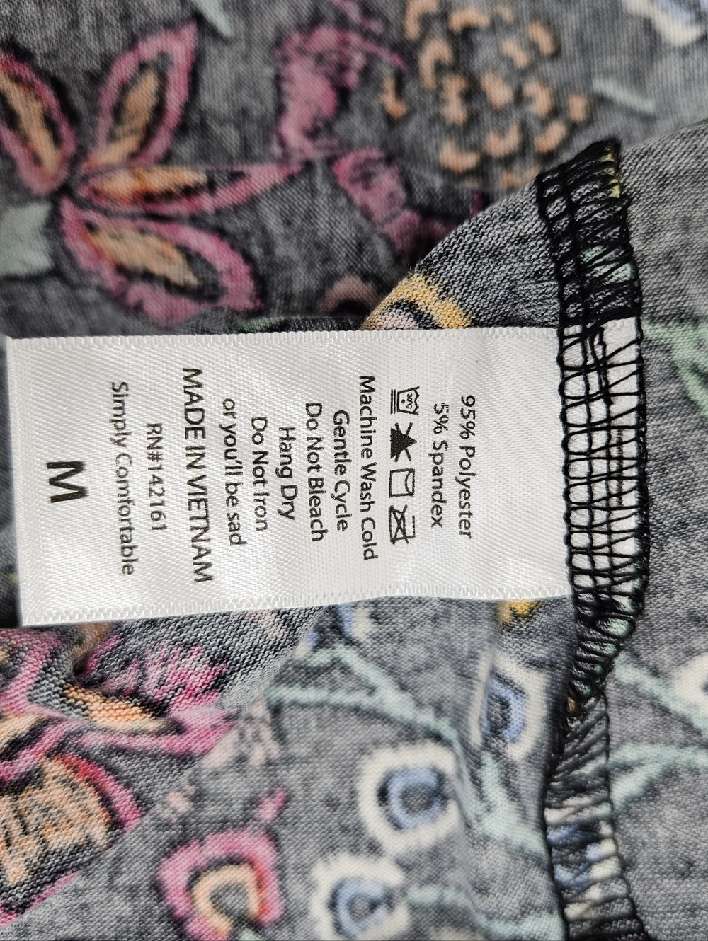 LuLaRoe Gigi Medium Black Short Sleeve Floral Tee with Multicolor - Picture 6 of 7